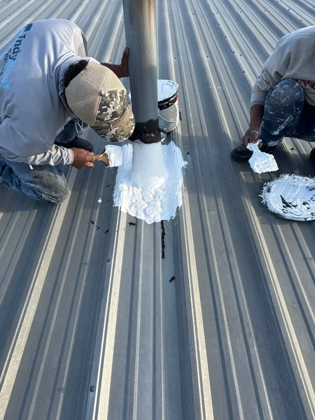 Tarping and dry-in on a Whitestown commercial roof
